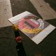 A poster of a medicine wheel lies across a “Los Angeles” crosswalk at sunset. Photo credit: Steph Viera, November 25, 2022