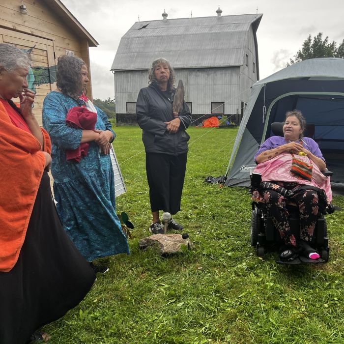 Bella Laboucan-Mclean's mother and aunt, alongside Terri Monture from No More Silence and Wanda Whitebird before their family's ceremony in the Hummingbird Lodge. Photo credit: Audrey Huntley