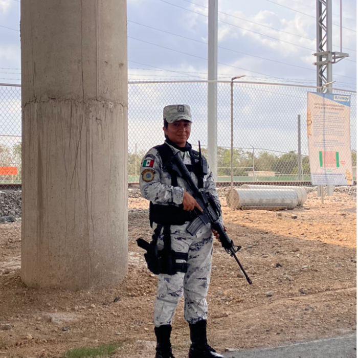A member of the National Guard stands at the entrance of the Teya Mérida train station, in Yucatán. Photo credit: Jesse Foley-Tapia