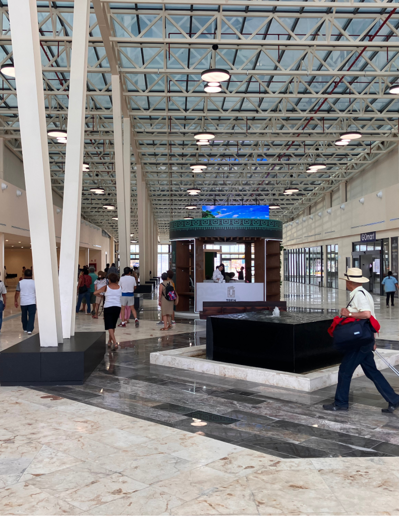 A man walks towards the ticket booth inside the Teya Mérida train station. Photo credit: Jesse Foley-Tapia