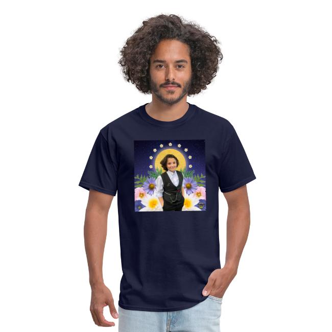 A man wearing the Rest in Sacredness Tee in Navy Blue that features a photo of a a starry sky, Nex Benedict is standing in front of a halo-like circle and is surrounded by flowers against a white.