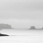 Alaska shoreline and islands shrouded in fog