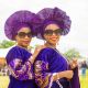 Taiwo and Kehinde Obasekore, 31, wear matching purple traditional attire and headwraps at the World Twins Festival in Igboora, Oyo State, Nigeria. In Yoruba tradition, twins are believed to share a unique soul bond and a mystical duality, making them deeply revered and lovingly protected within their communities. Photo credit: Bukunmi Oyewole,  October 9, 2021