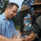 Tuskegee Syphilis Study doctor injects a Black man with a placebo.
